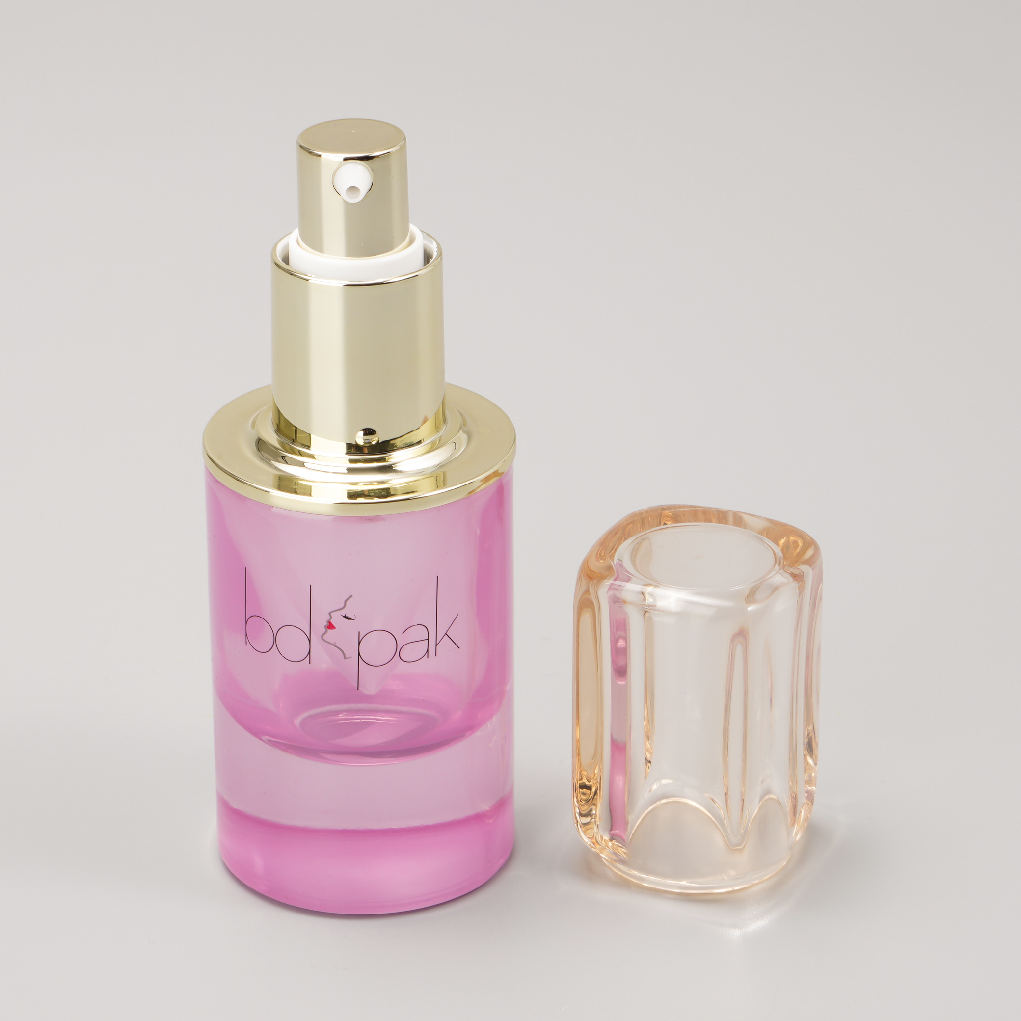 Thick sole pink glass pump bottle