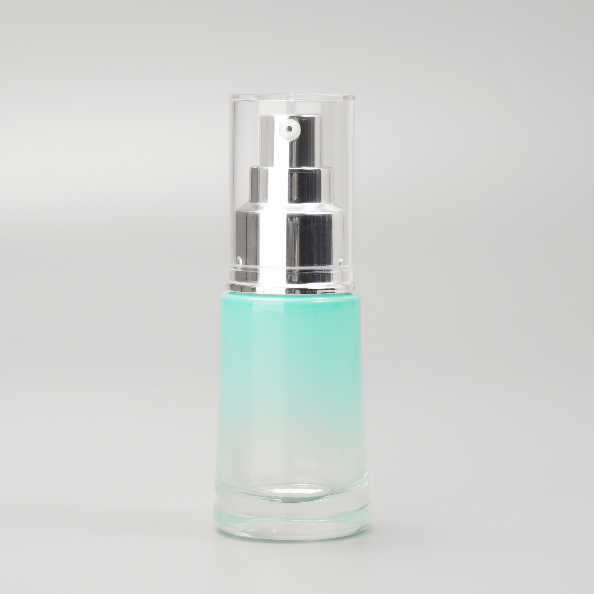 blue serum pump bottle with clear cap