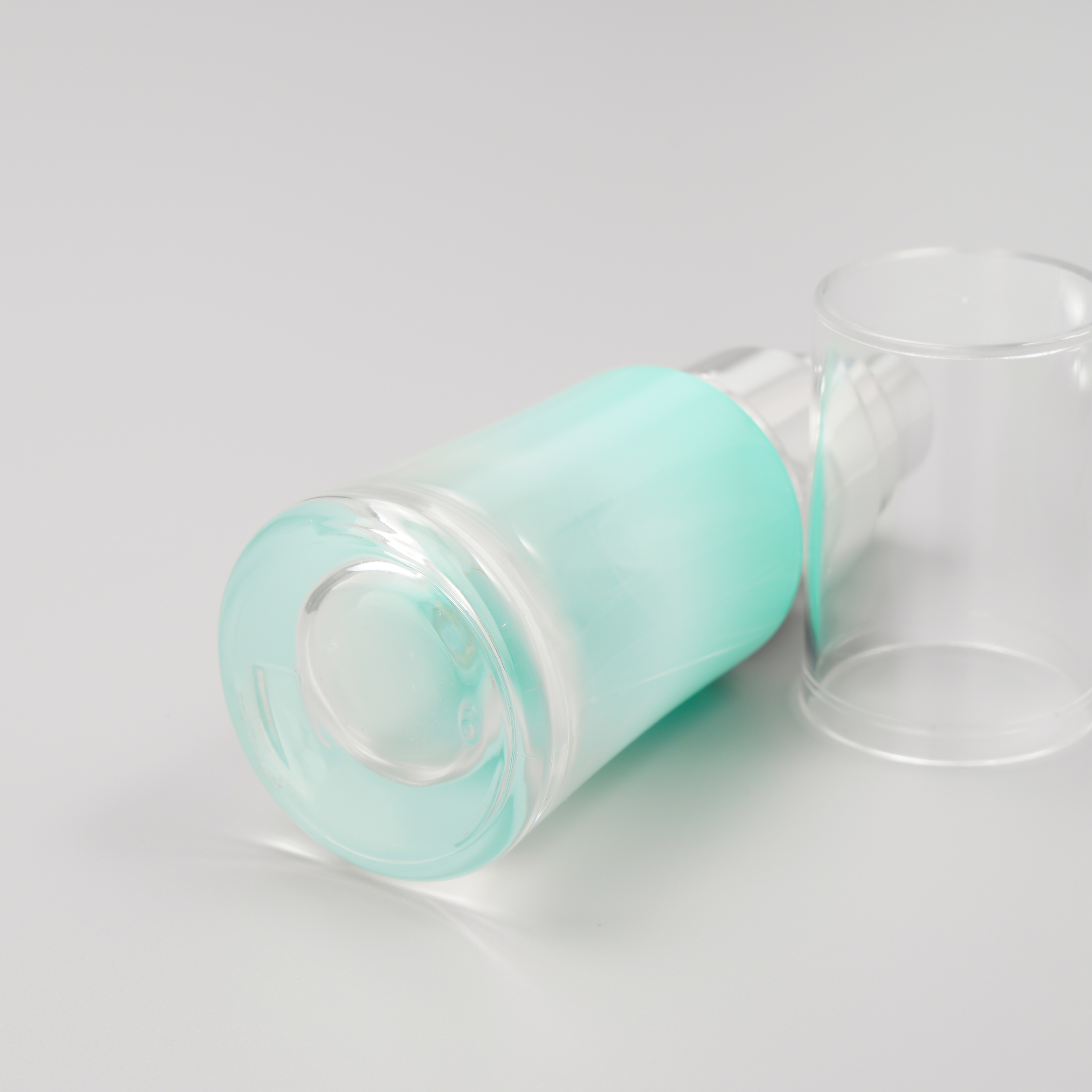 blue serum pump bottle with clear cap