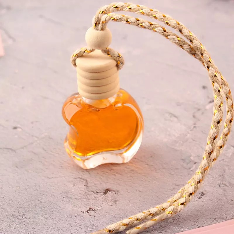 Free Sample Apple Bottle Car Pendant 10Ml Transparent Glass Perfume Empty Bottle Car Perfume Bottle with Wooden Cap